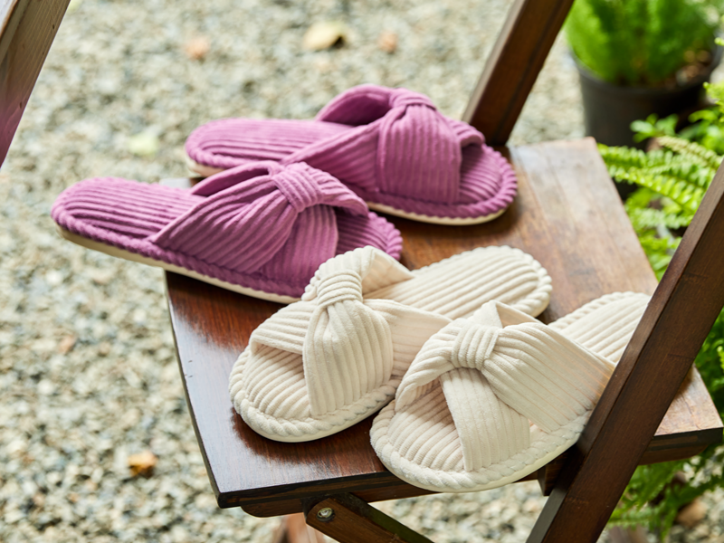 Reusable slippers can extend the feeling of a stay beyond checkout.